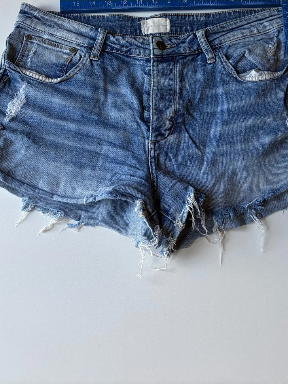 Buckle Gilded Intent Light Blue Distressed Denim Cutoff Shorts